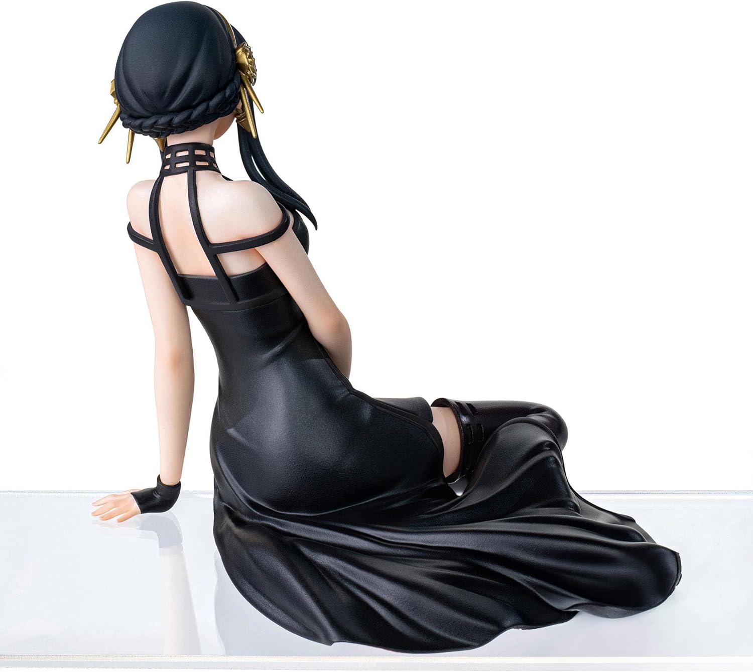 Back view of sega spy x family pm perching statue featuring yor forger in black satin dress with gold hair accessories and intricate straps